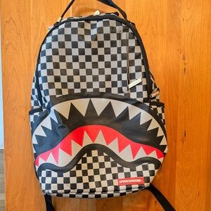 Sprayground Black and Gray Checkered Shark Backpack